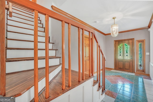 341 Fox Rd, Griffin, GA 30224 - entrance foyer with stairway, a chandelier, and crown molding