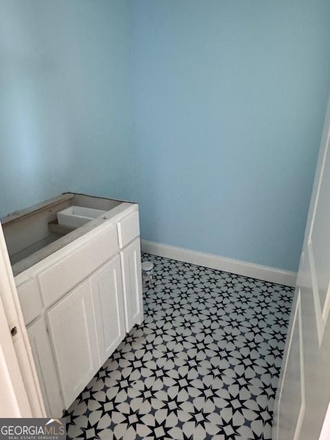 2191 Isles Of St Marys Way, Saint Marys, GA 31558 - bathroom featuring tile patterned floors, toilet, and baseboards