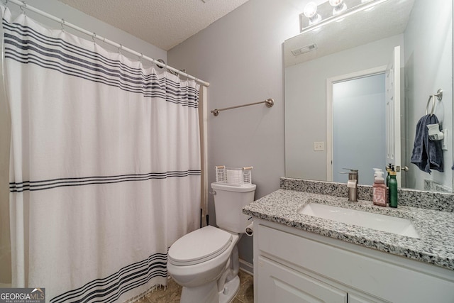 463 Rebekah Dr, Bethlehem, GA 30620 - bathroom featuring vanity, toilet, a textured ceiling, and visible vents