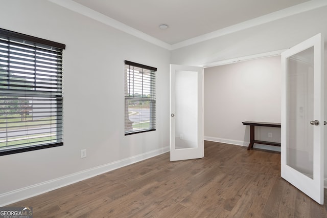 63 Brookstone Park E, Acworth, GA 30101 - spare room featuring french doors, wood finished floors, baseboards, and ornamental molding