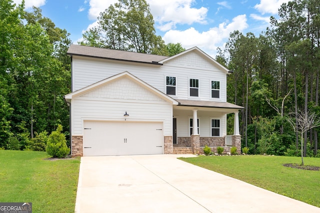63 Brookstone Park E, Acworth, GA 30101 - craftsman house with concrete driveway, stone siding, a front yard, and a porch
