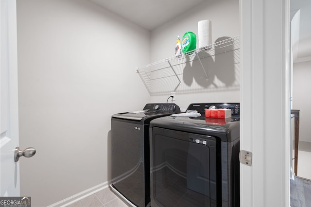 63 Brookstone Park E, Acworth, GA 30101 - laundry room featuring washer and clothes dryer and baseboards