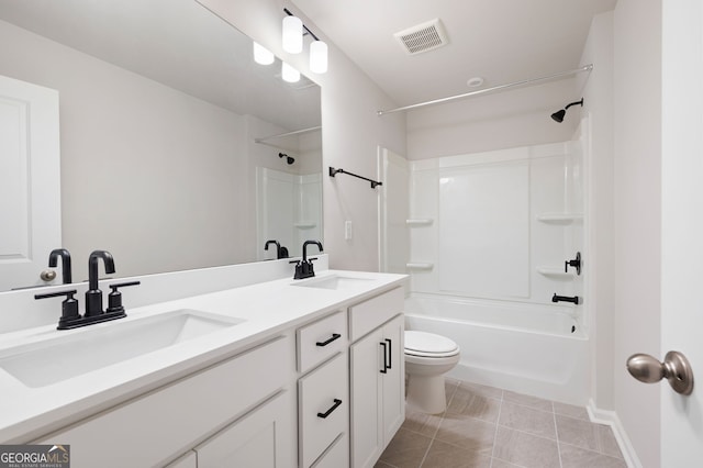 63 Brookstone Park E, Acworth, GA 30101 - full bath featuring toilet, double vanity, tub / shower combination, and tile patterned flooring