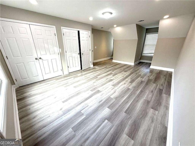 6945 Autumn Hills Dr, Cumming, GA 30028 - interior space featuring recessed lighting, baseboards, visible vents, and wood finished floors