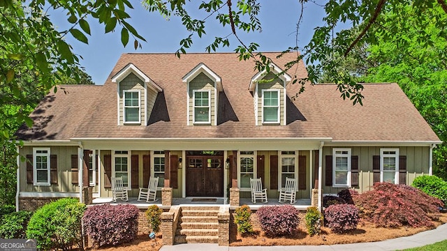 1122 Irongate, Macon, GA 31220 - cape cod house with covered porch, roof with shingles, and board and batten siding