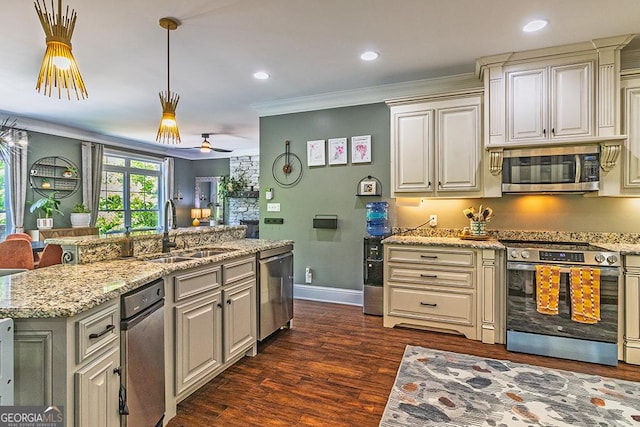 1122 Irongate, Macon, GA 31220 - kitchen with a sink, dark wood finished floors, crown molding, baseboards, and appliances with stainless steel finishes