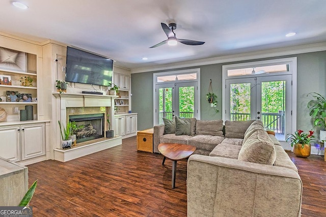 1122 Irongate, Macon, GA 31220 - living area with french doors, a fireplace, dark wood finished floors, ceiling fan, and ornamental molding