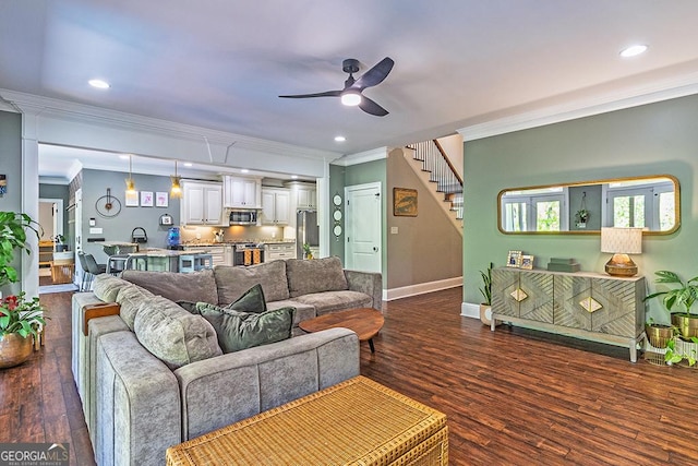 1122 Irongate, Macon, GA 31220 - living room with stairs, dark wood finished floors, crown molding, ceiling fan, and baseboards