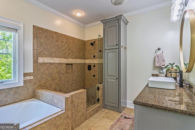 1122 Irongate, Macon, GA 31220 - bathroom featuring vanity, ornamental molding, a stall shower, tile patterned flooring, and a bath