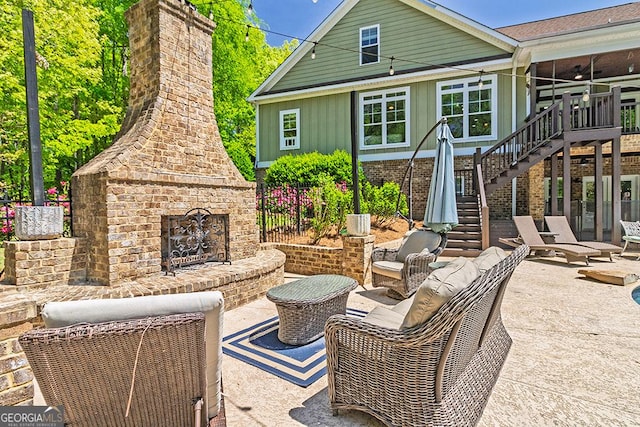 1122 Irongate, Macon, GA 31220 - view of patio featuring an outdoor living space with a fireplace and stairway