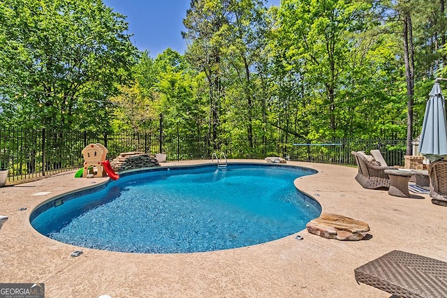 1122 Irongate, Macon, GA 31220 - view of swimming pool featuring a patio, a fenced in pool, and a fenced backyard