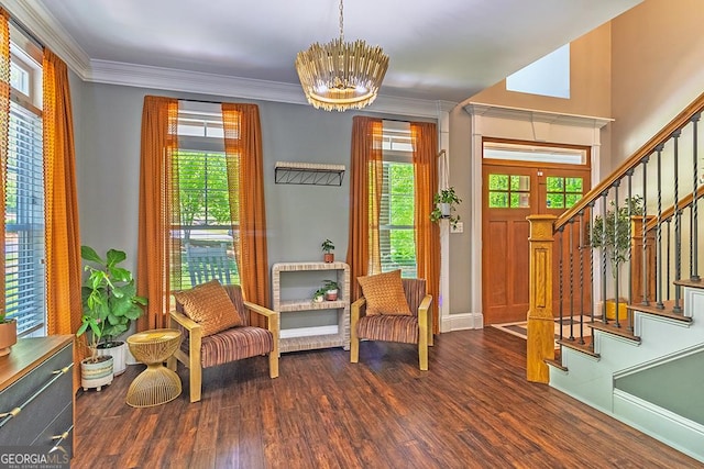 1122 Irongate, Macon, GA 31220 - living area with an inviting chandelier, wood finished floors, stairway, baseboards, and ornamental molding