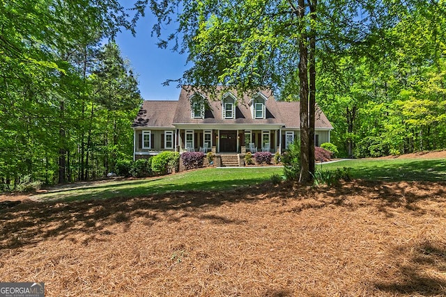 1122 Irongate, Macon, GA 31220 - new england style home featuring covered porch and a front yard