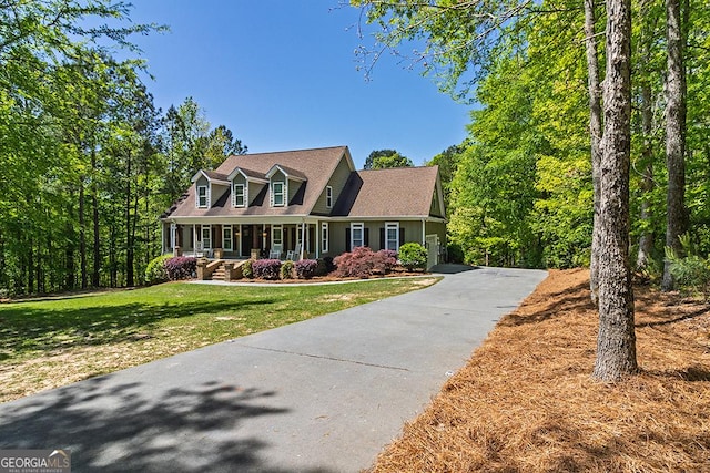1122 Irongate, Macon, GA 31220 - cape cod-style house with a front lawn, a porch, and driveway