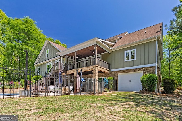 1122 Irongate, Macon, GA 31220 - rear view of property featuring ceiling fan, fence, a garage, and board and batten siding