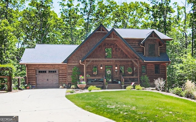 366 Shepherds Way, Morganton, GA 30560 - log cabin with a garage, a porch, concrete driveway, and a front lawn