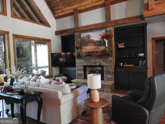 366 Shepherds Way, Morganton, GA 30560 - living room featuring a stone fireplace, built in shelves, wood finished floors, and wood ceiling