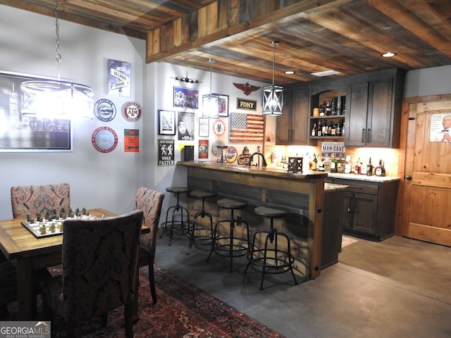 366 Shepherds Way, Morganton, GA 30560 - indoor wet bar with wooden ceiling, finished concrete flooring, pendant lighting, and decorative backsplash