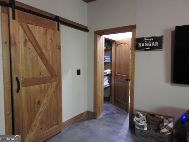 366 Shepherds Way, Morganton, GA 30560 - corridor with a barn door, concrete floors, and baseboards