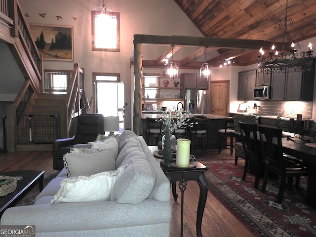 366 Shepherds Way, Morganton, GA 30560 - living room with wood finished floors, wooden ceiling, high vaulted ceiling, a chandelier, and stairs