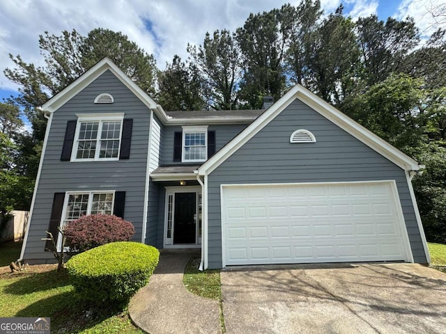 1048 Brandon Ln, Stone Mountain, GA 30083 - view of front of home with driveway and an attached garage