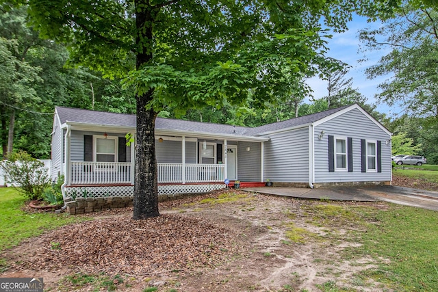 7845 Chase Woods Dr, Jonesboro, GA 30236 - view of front of property featuring a porch and roof with shingles