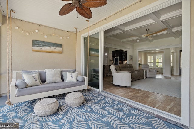 106 Jake Colton Dr, Kingsland, GA 31548 - living room with coffered ceiling, ceiling fan, beamed ceiling, and hardwood / wood-style floors