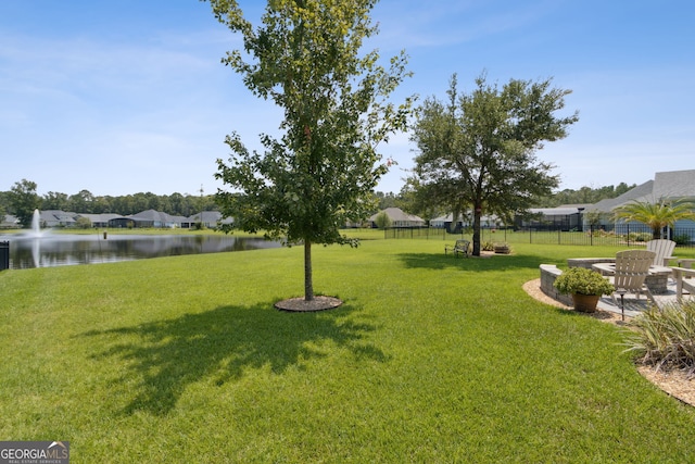106 Jake Colton Dr, Kingsland, GA 31548 - view of yard with a water view and fence