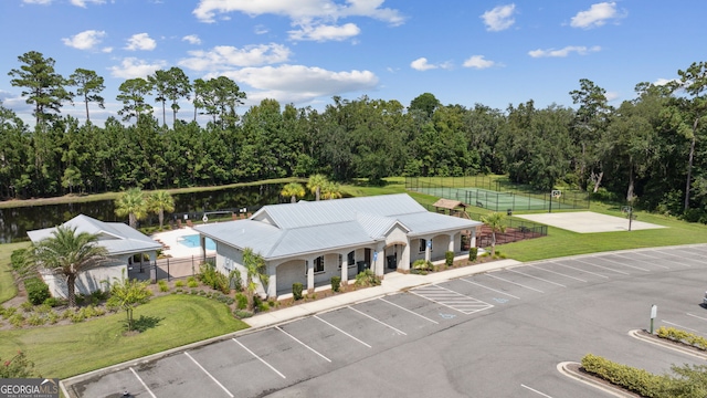 106 Jake Colton Dr, Kingsland, GA 31548 - view of building exterior featuring uncovered parking and fence
