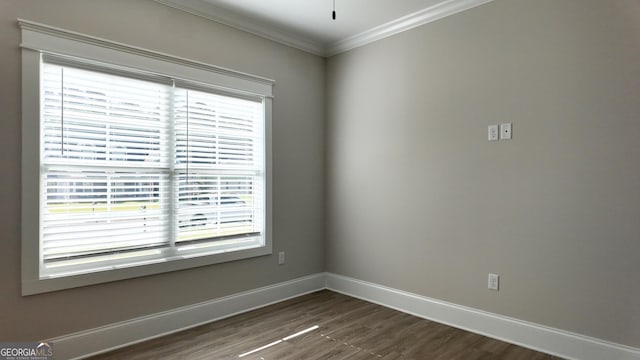 216 Morningside Dr, Thomasville, GA 31792 - empty room with baseboards, crown molding, and dark wood-type flooring