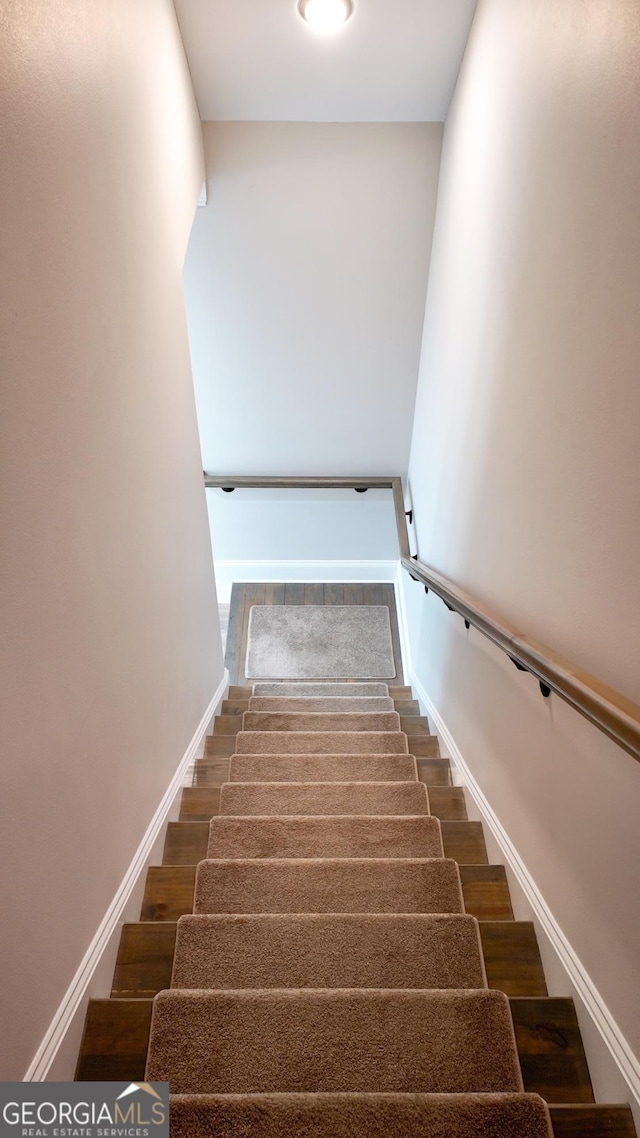 216 Morningside Dr, Thomasville, GA 31792 - stairs with baseboards and wood finished floors