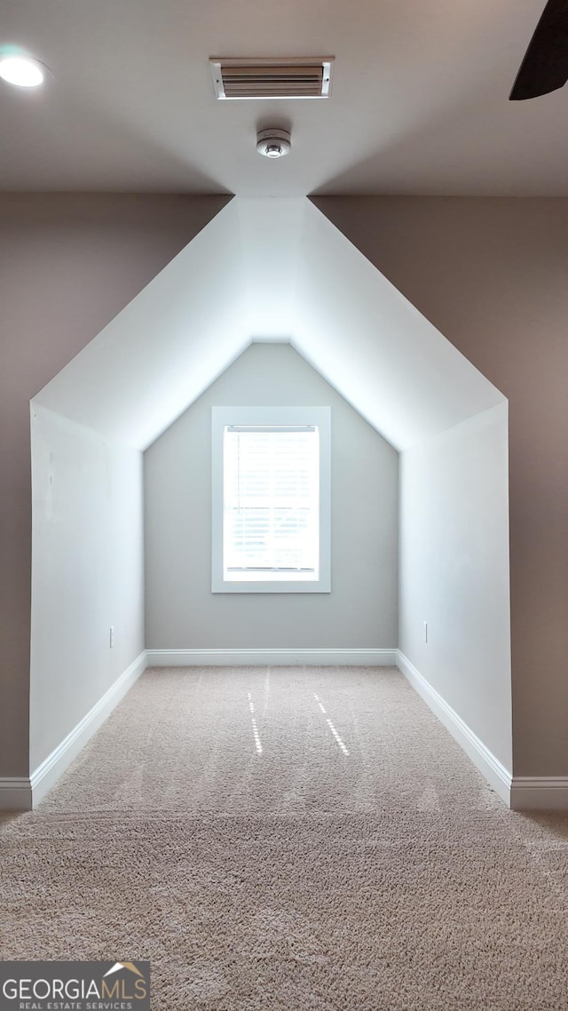 216 Morningside Dr, Thomasville, GA 31792 - additional living space featuring lofted ceiling, baseboards, ceiling fan, visible vents, and carpet floors