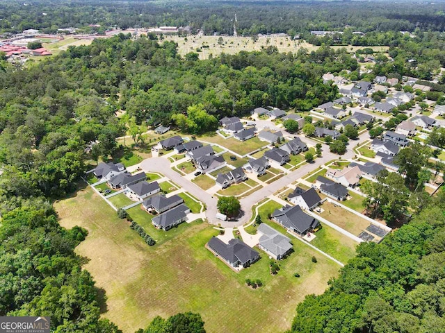 216 Morningside Dr, Thomasville, GA 31792 - drone / aerial view featuring a wooded view and a residential view