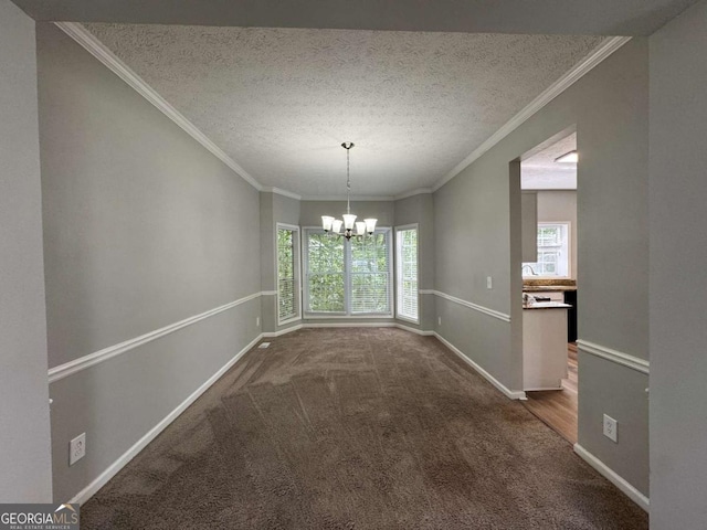 unfurnished dining area featuring baseboards, dark carpet, an inviting chandelier, and a textured ceiling