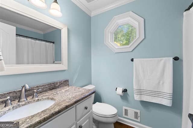 bathroom with toilet, wood finished floors, visible vents, vanity, and ornamental molding