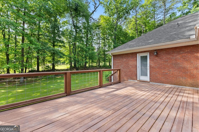 deck featuring a yard