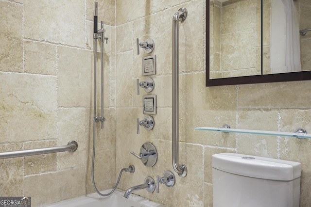 bathroom with toilet and shower / bathtub combination