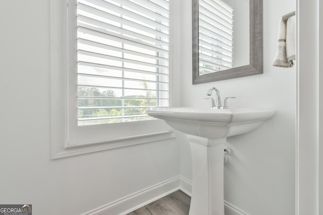 3313 Bartee Walk, Suwanee, GA 30024 - bathroom with baseboards and wood finished floors