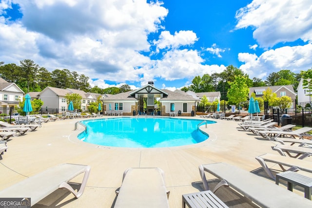 3313 Bartee Walk, Suwanee, GA 30024 - community pool with fence, a patio area, and a residential view