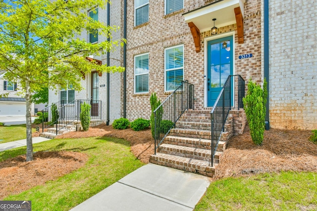 3313 Bartee Walk, Suwanee, GA 30024 - doorway to property with brick siding