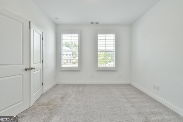 3313 Bartee Walk, Suwanee, GA 30024 - spare room featuring baseboards and light colored carpet