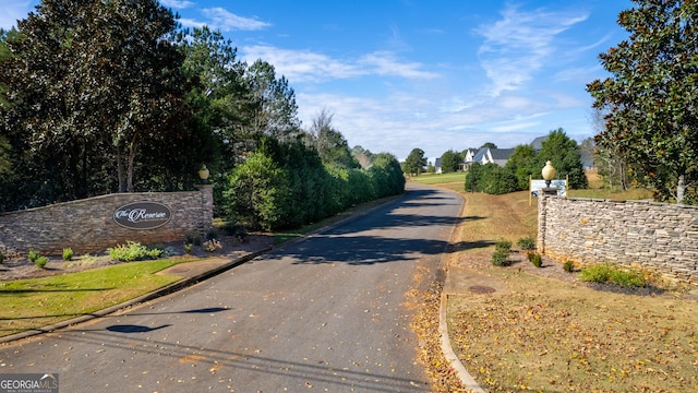 view of road with curbs