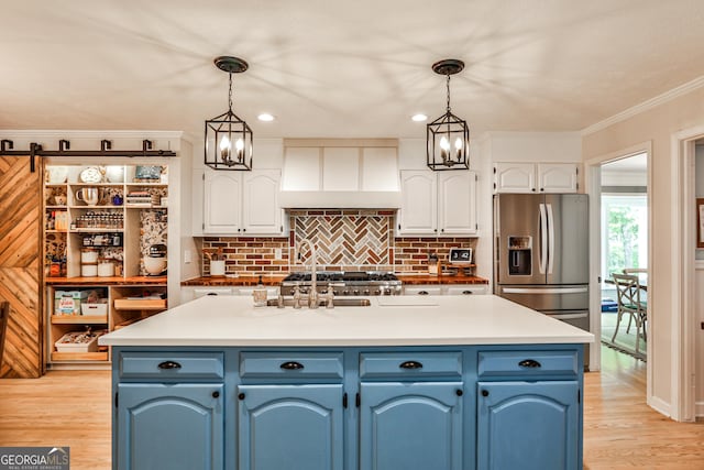 2244 Deer Ridge Dr, Tucker, GA 30087 - kitchen with blue cabinets, stainless steel refrigerator with ice dispenser, premium range hood, white cabinets, and backsplash