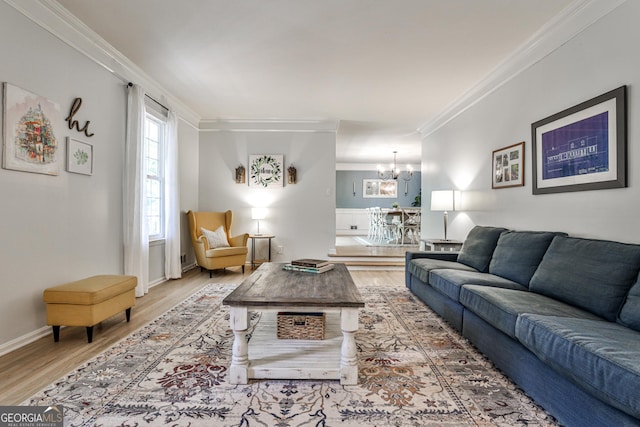 2244 Deer Ridge Dr, Tucker, GA 30087 - living room with a chandelier, wood finished floors, ornamental molding, and baseboards