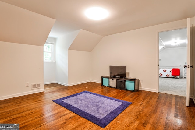 2244 Deer Ridge Dr, Tucker, GA 30087 - bonus room with vaulted ceiling, wood finished floors, and baseboards