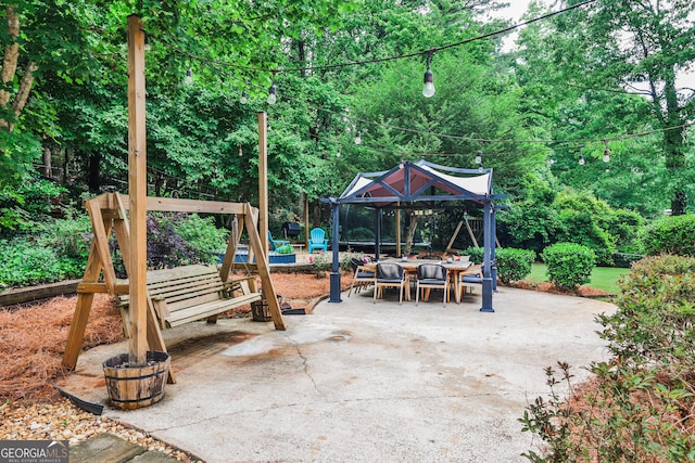2244 Deer Ridge Dr, Tucker, GA 30087 - view of patio / terrace with a trampoline and an outdoor hangout area