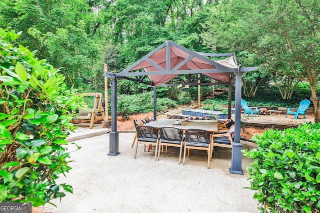 2244 Deer Ridge Dr, Tucker, GA 30087 - view of patio / terrace with an outdoor fire pit and outdoor dining area