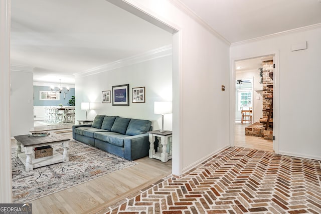 2244 Deer Ridge Dr, Tucker, GA 30087 - living room featuring crown molding, a chandelier, brick flooring, and baseboards