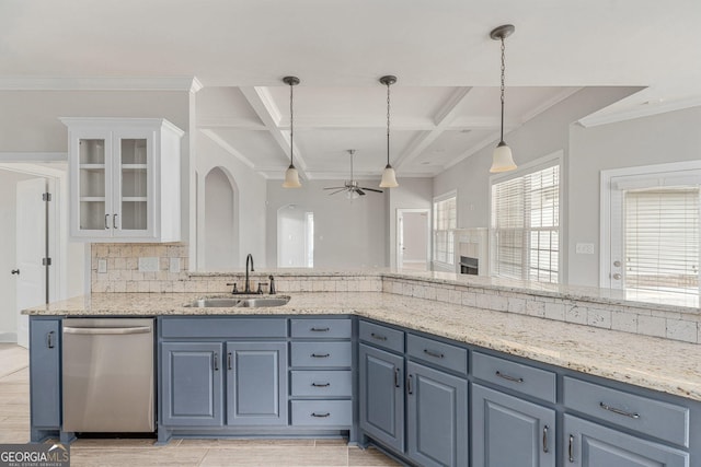 kitchen with light stone countertops, coffered ceiling, dishwasher, ceiling fan, and a sink