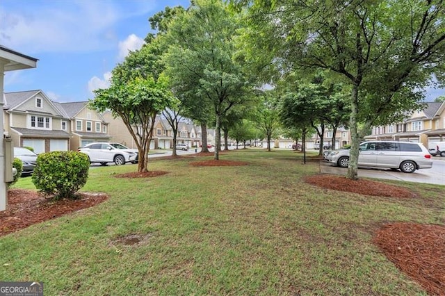 view of yard with a residential view